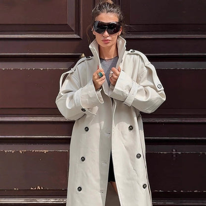 Women's waistless long trench coat in oversized cut with double button placket and shoulder flaps EVA-US