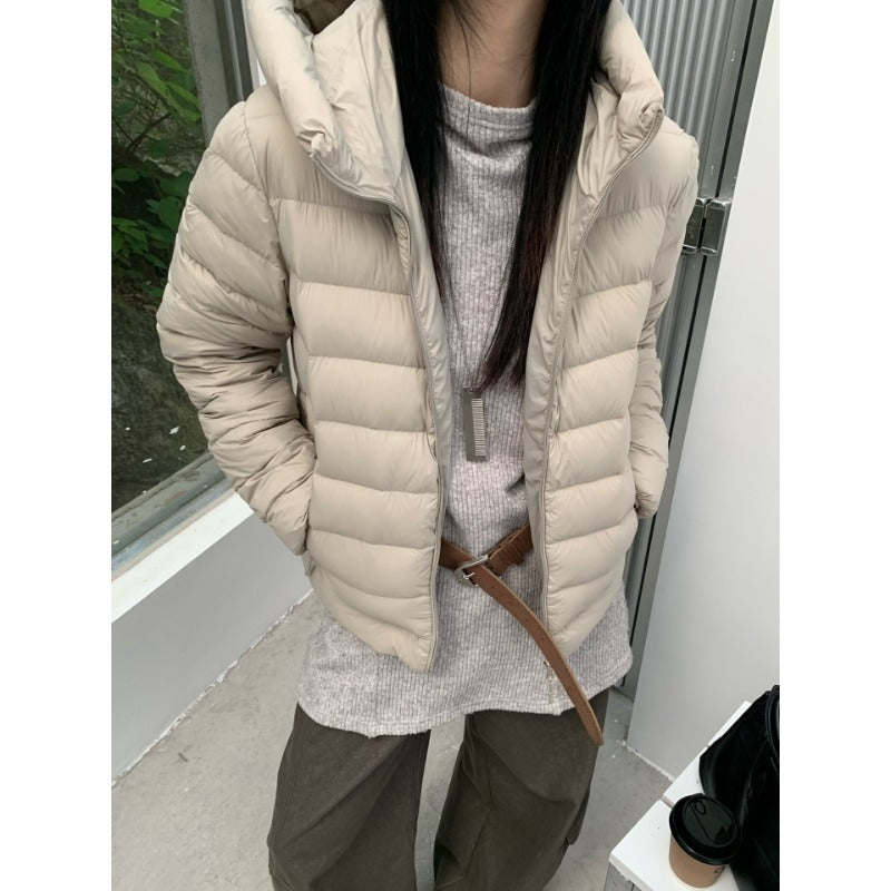 Women's quilted down jacket with high collar and light thermal insulation EVA-US
