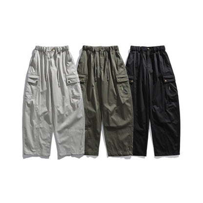 Men's cargo pants with elastic waistband, drawstring, and multiple utility pockets EVA-US