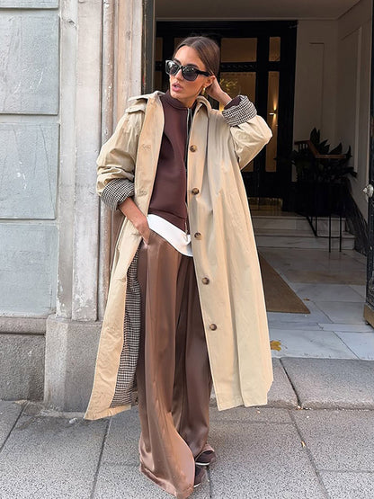 Women's maxi-length trench coat with check lining, wide fall & classic button placket