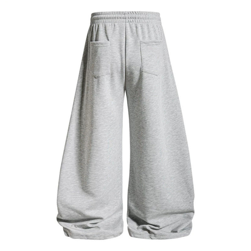 Women's loose jogging pants with elastic waistband and decorative lacing EVA-US