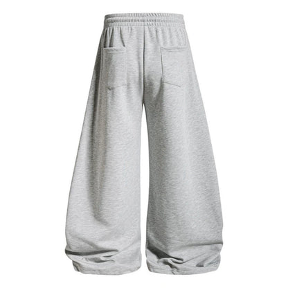Women's loose jogging pants with elastic waistband and decorative lacing EVA-US