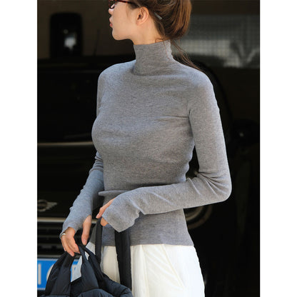 Women's body-hugging fine knit turtleneck sweater with elongated sleeves and thumb hole EVA-US