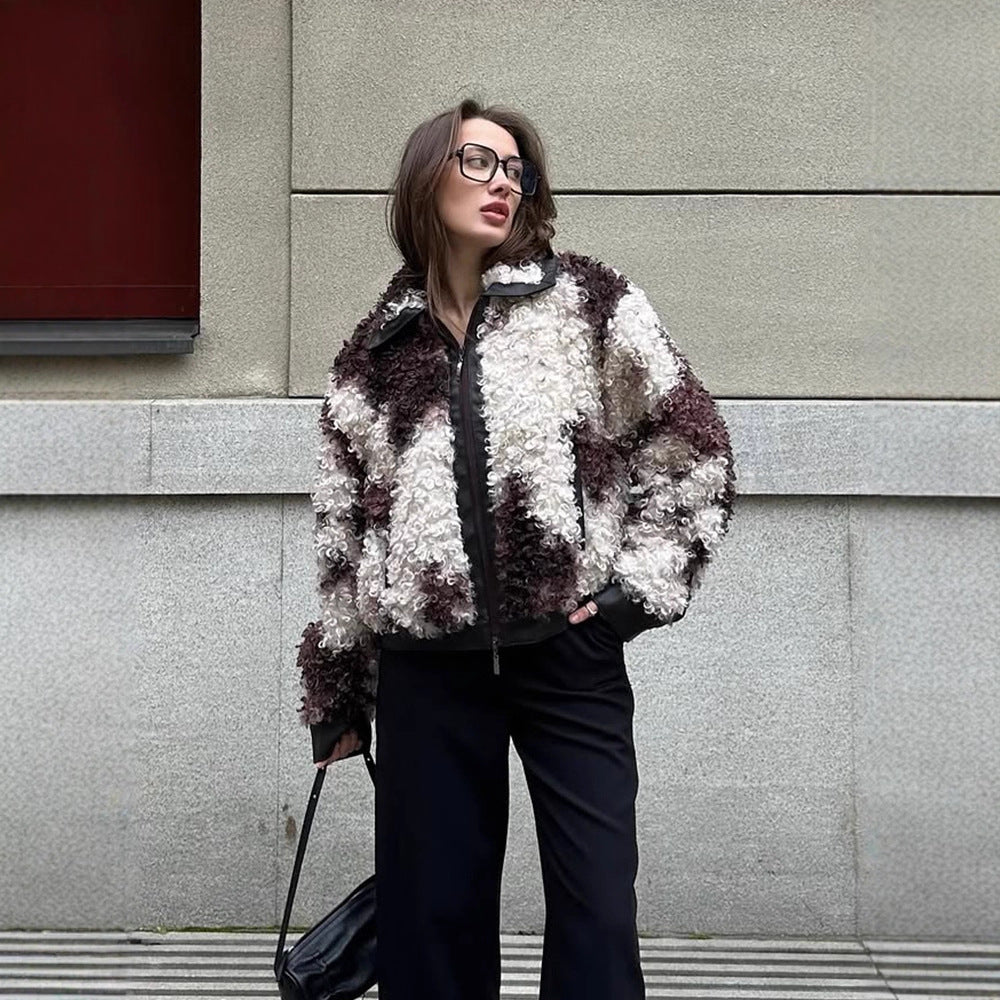 Women's short jacket made of curly bouclé faux fur with leather look detailing EVA-US