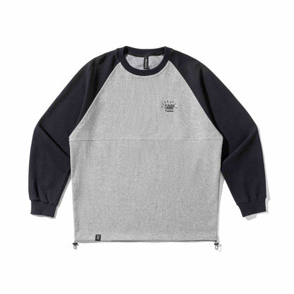 Unisex Raglan Sweatshirt with thermal waffle texture, drawstring hem, and discreet chest embroidery EVA-US