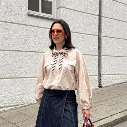 Women’s blouse with bow collar, dropped shoulder section and voluminous balloon sleeves EVA-US