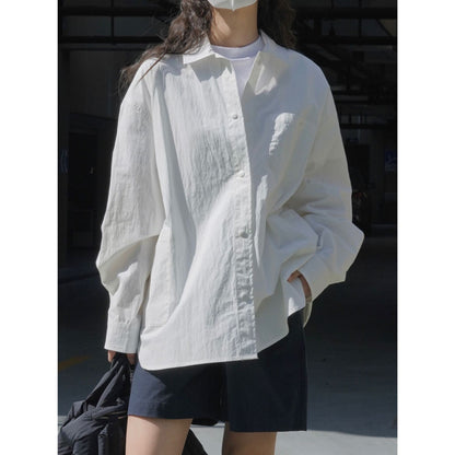 Women's Oversized Cotton Shirt Jacket with Chest Pocket and Extended Back EVA-US