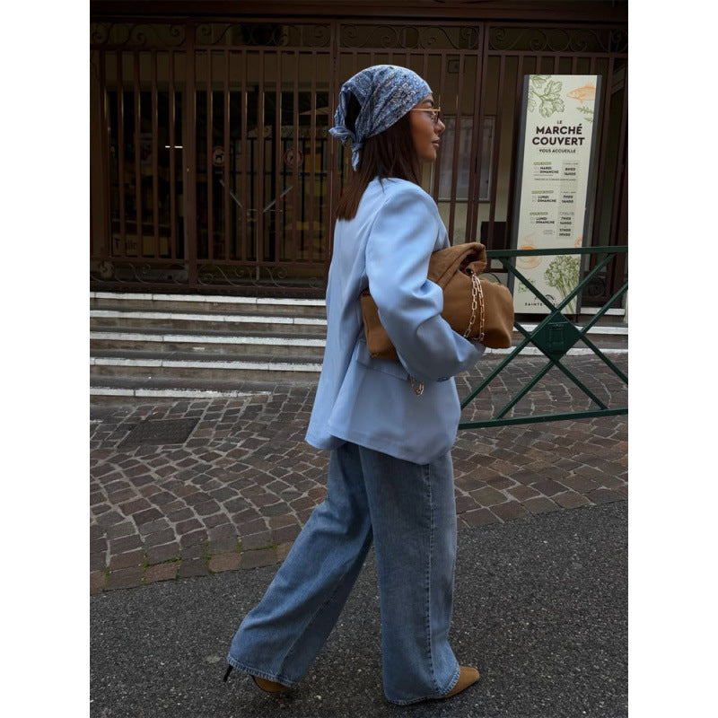 Women’s oversized long blazer with boxy silhouette, soft shoulders, and extended cut.