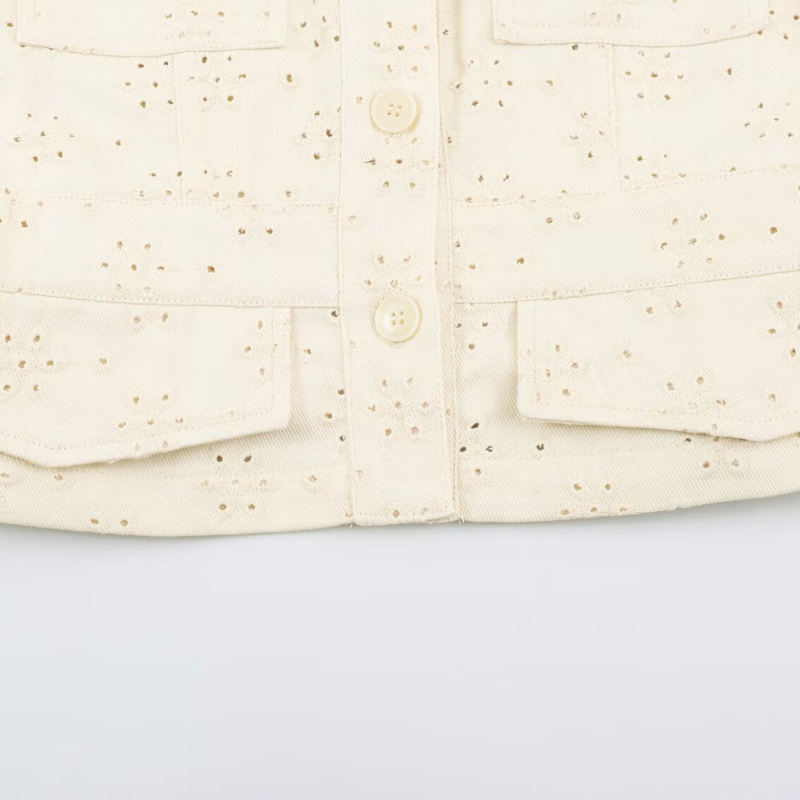 Ladies short jacket made of broderie anglaise with stand-up collar and patch pockets EVA-US