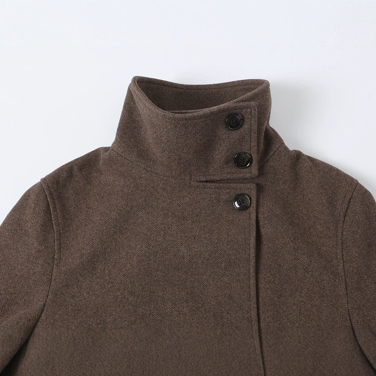 Women's wool coat with stand-up collar, tie belt and asymmetric button placket EVA-US