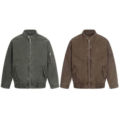Men's short cut vintage-wash bomber jacket in boxy cut with stand-up collar and sleeve zip.