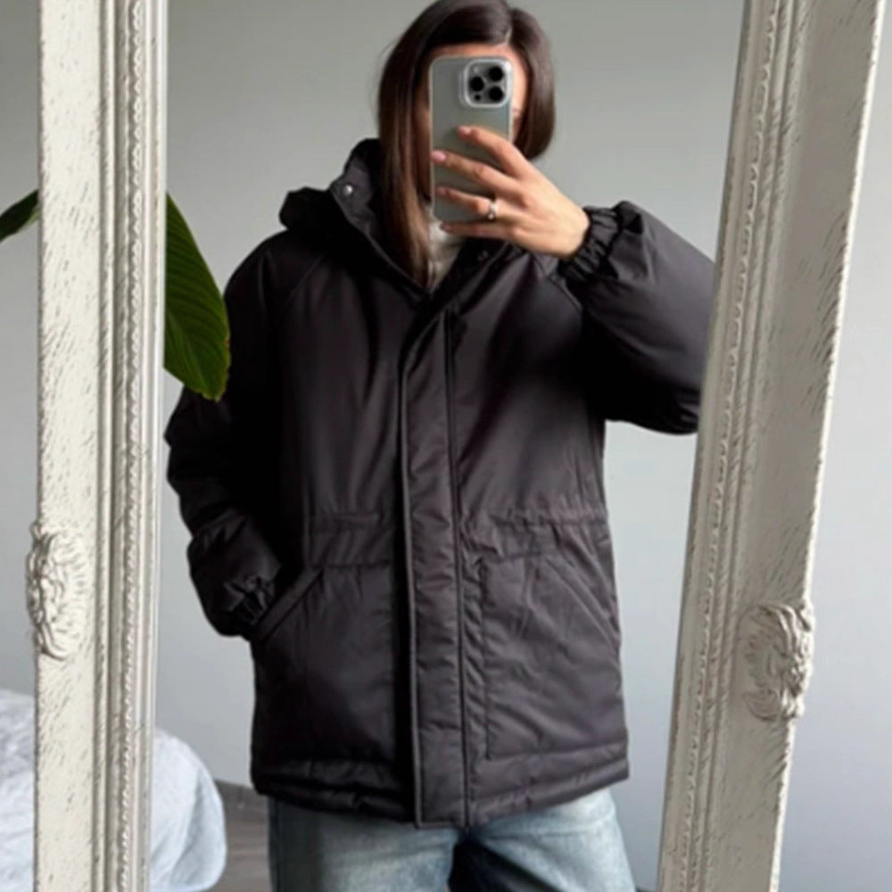 Women's quilted parka with high collar, fitted drawstring, and hood EVA-US