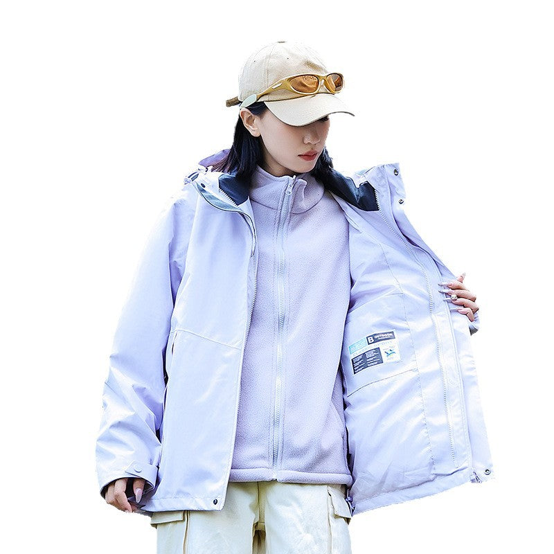 Women’s technical multi-layer hardshell rain jacket with adjustable hood, chest strap, and water-resistant zippers EVA-US