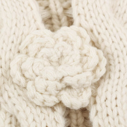Women's knitted vest with cable pattern, flower appliqués and bobble texture EVA-US