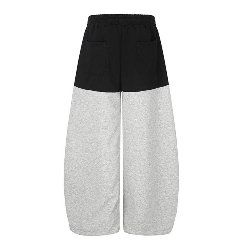 Women's Oversize Two-Tone Palazzo Sweatpants made of French Terry with logo studs, drawstring and adjustable hem.