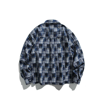 Unisex patchwork check shirt jacket in oversized boxy cut with chest pocket and Kent collar EVA-US
