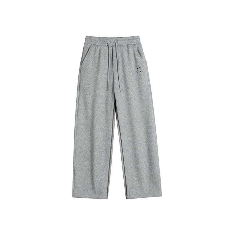 Women's sweatpants with wide legs, elastic waistband and drawstring