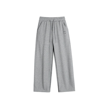 Women's sweatpants with wide legs, elastic waistband and drawstring