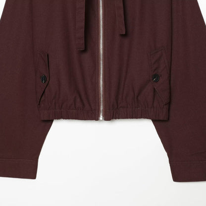 Women's short bomber-style jacket with high funnel collar, concealed zipper, and flap pockets EVA-US