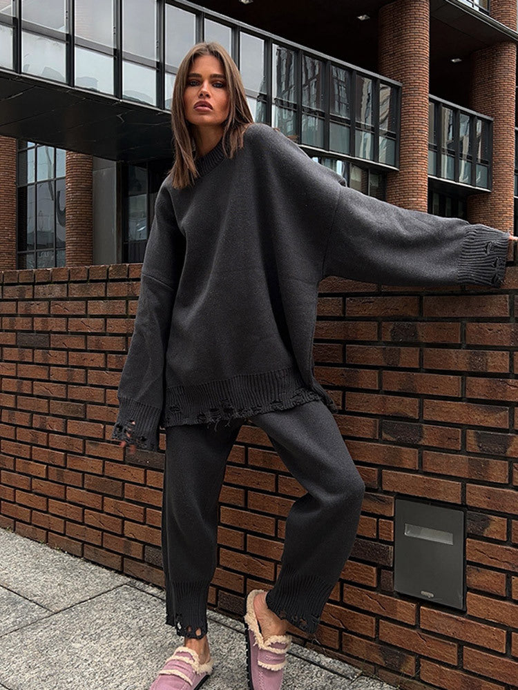 Ladies oversized knit set made of fine knit with destroyed hem, loose sweater, and casual slip-on pants EVA-US