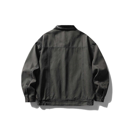 Men's tailored canvas blouson with contrasting leather collar and elastic hem.