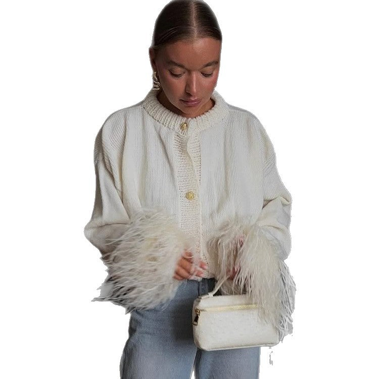 Women's knitted cardigan with feather trim at sleeve cuffs and golden decorative buttons EVA-US