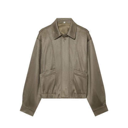 Women's cropped blouson jacket in suede look with shirt collar, epaulettes, and elastic waistband.