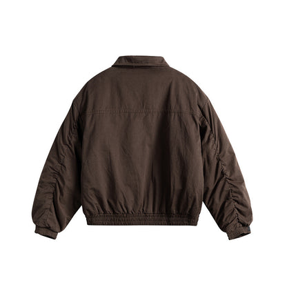 Men's short boxy blouson with shirt collar, utility chest pockets, and elastic hem EVA-US