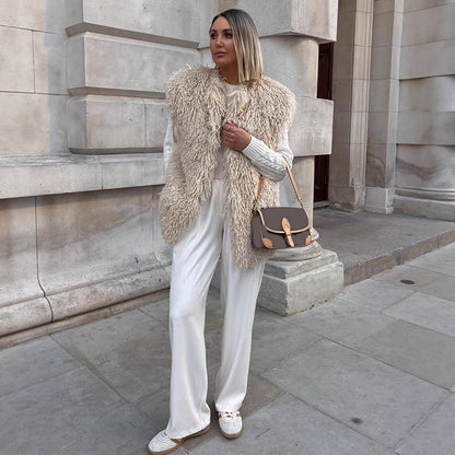 Women's Longer Cozy Faux Fur Vest with Shaggy Look and Front Pockets EVA-US