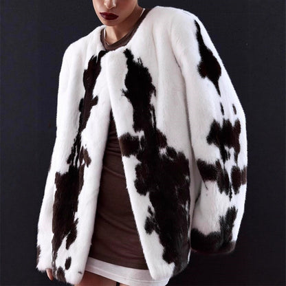 Women's short coat made of faux fur with boxy silhouette and cow print pattern EVA-US