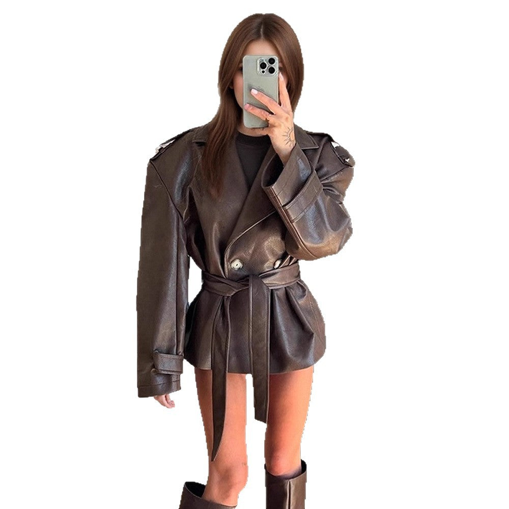 Women's short jacket made of faux leather with waistbelt and oversized shoulder area EVA-US