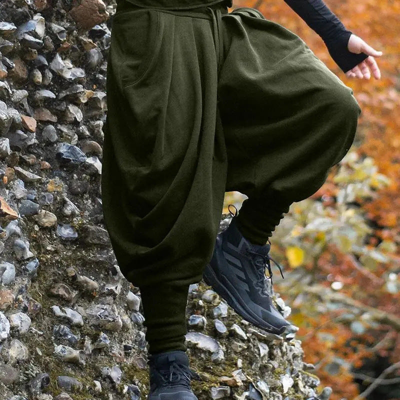 Men's avant-garde harem pants with wrap front, elastic waistband, and narrow lower leg EVA-US