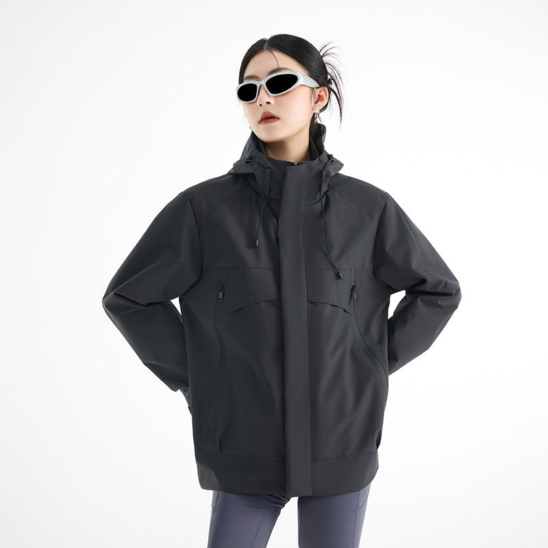 Women's technical waterproof oversized parka with hood and concealed zip pockets EVA-US