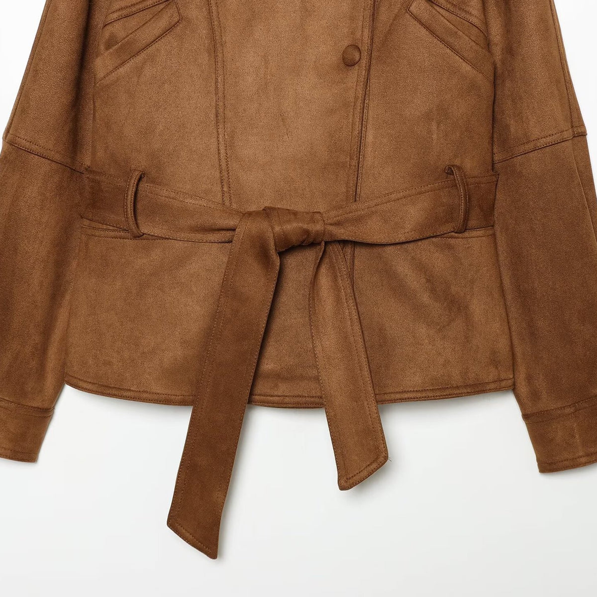 Women's tailored short jacket made of soft suede imitation with asymmetrical button placket and tie belt EVA-US