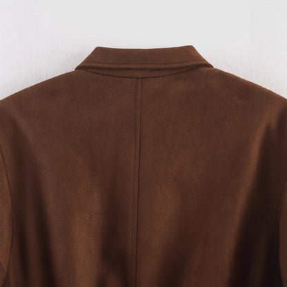 Women's cropped bomber jacket in velour look with shirt collar, sleeve pocket, and fitted ribbed waistband.