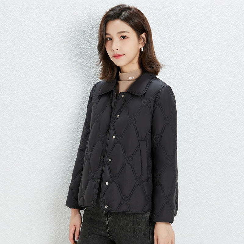 Women Short Cut Quilted Jacket with Decorative Stitching and Rounded Hem EVA-US