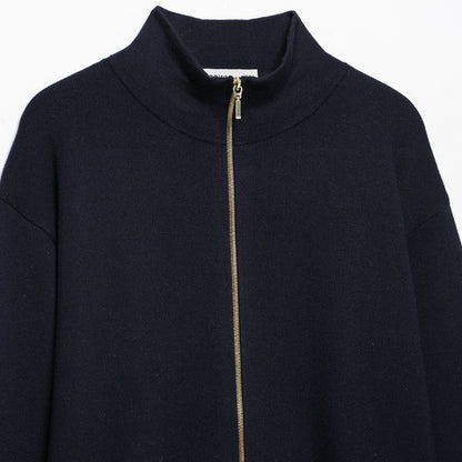 Women's cropped fine-knit cardigan with standing collar, full-length zipper, and fitted ribbed section.