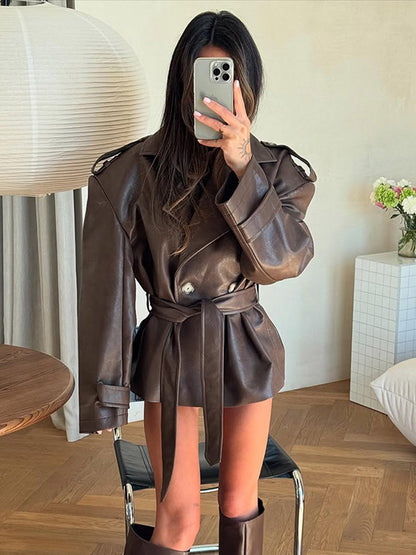 Women's short jacket made of faux leather with waistbelt and oversized shoulder area EVA-US