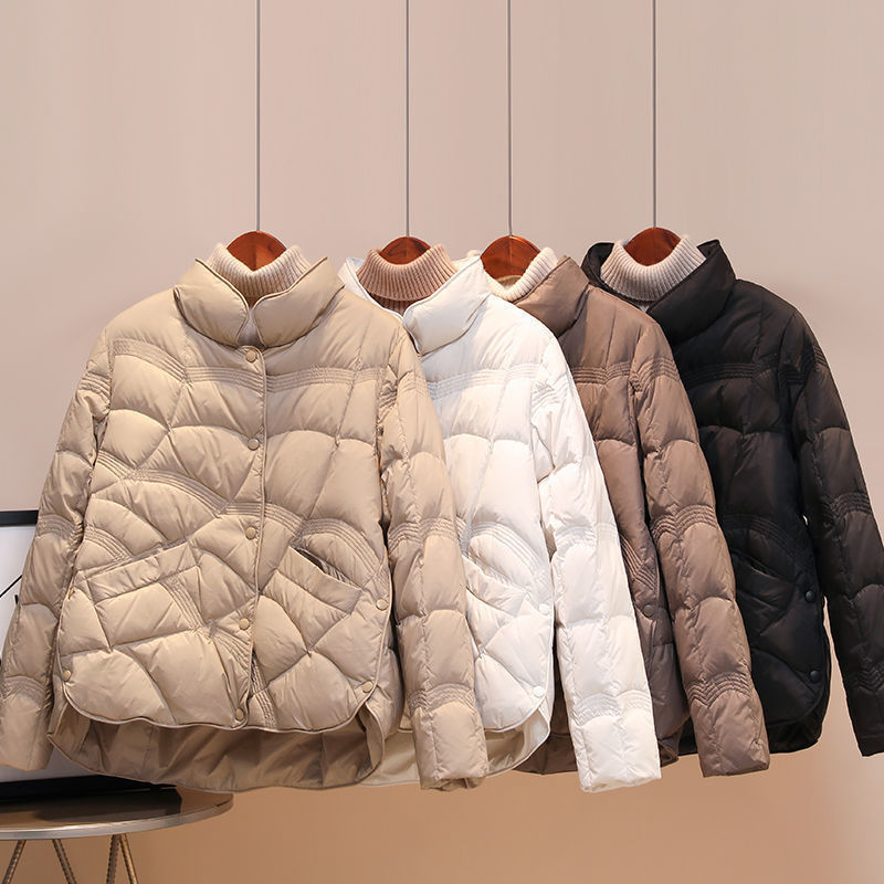 Women's quilted thermal jacket with high collar and decorative wave quilting EVA-US