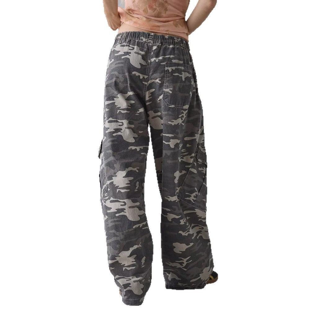 Women's wide cargo pants with elastic waistband and large flap pockets