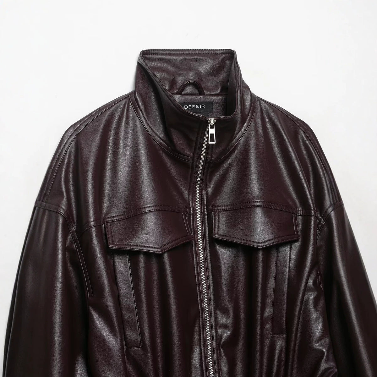 Women's Oversized Faux Leather Bomber Jacket with Funnel Neck, Drawstring Waist, and Flap Pockets EVA-US