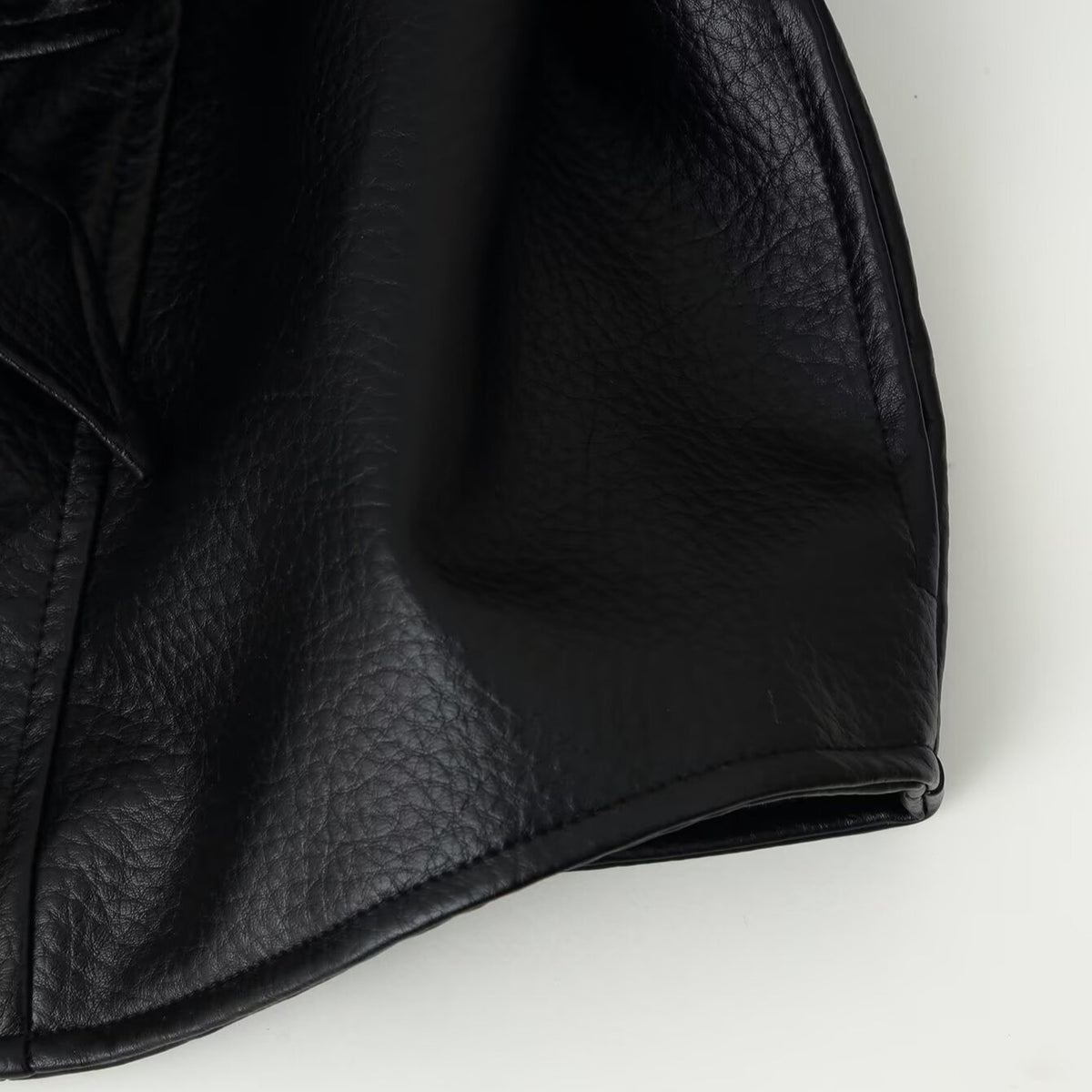 Women's short blazer made of vegan leather with shawl collar and waist tie belt EVA-US