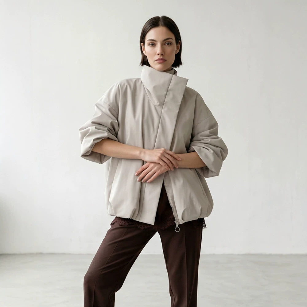Women's boxy short quilted jacket with high asymmetric stand-up collar EVA-US