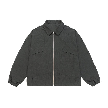 Unisex short jacket in boxy cut with shirt collar, visible metal zipper and utility patch pockets EVA-US