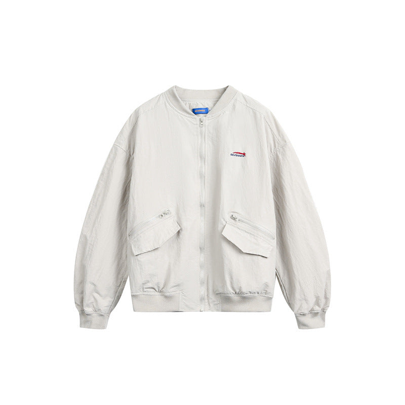 Unisex short cut lightweight nylon bomber jacket with utility pockets and ribbed hem EVA-US