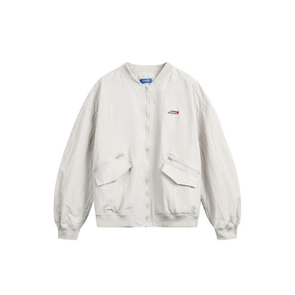 Unisex short cut lightweight nylon bomber jacket with utility pockets and ribbed hem EVA-US