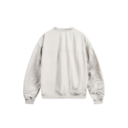 Unisex short cut lightweight nylon bomber jacket with utility pockets and ribbed hem EVA-US