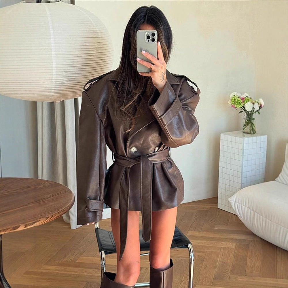Women's short jacket made of faux leather with waistbelt and oversized shoulder area EVA-US