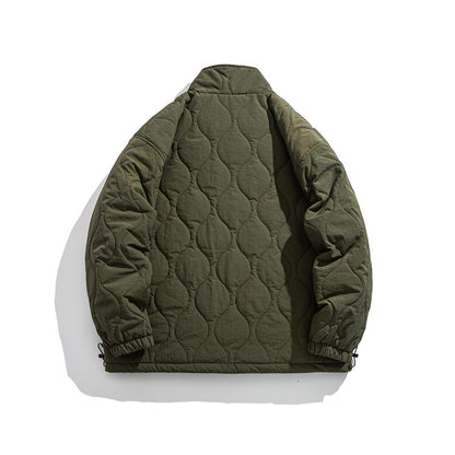 Unisex Boxy quilted jacket in military liner style with high stand-up collar and adjustable hem EVA-US