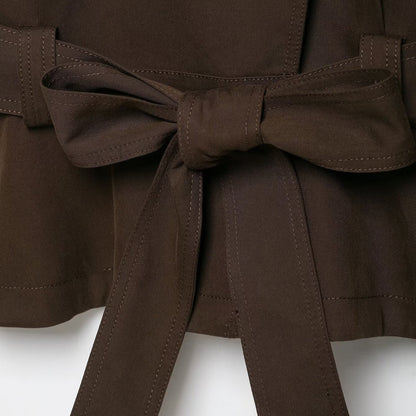 Women's short trench coat with high stand-up collar, tie belt, and asymmetrical button placket EVA-US